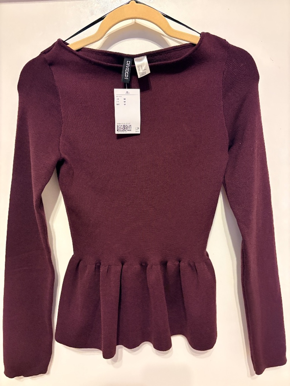 Divided knitted Peplum Top.